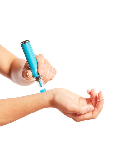 The Genteel Lancing Device in action on a wrist